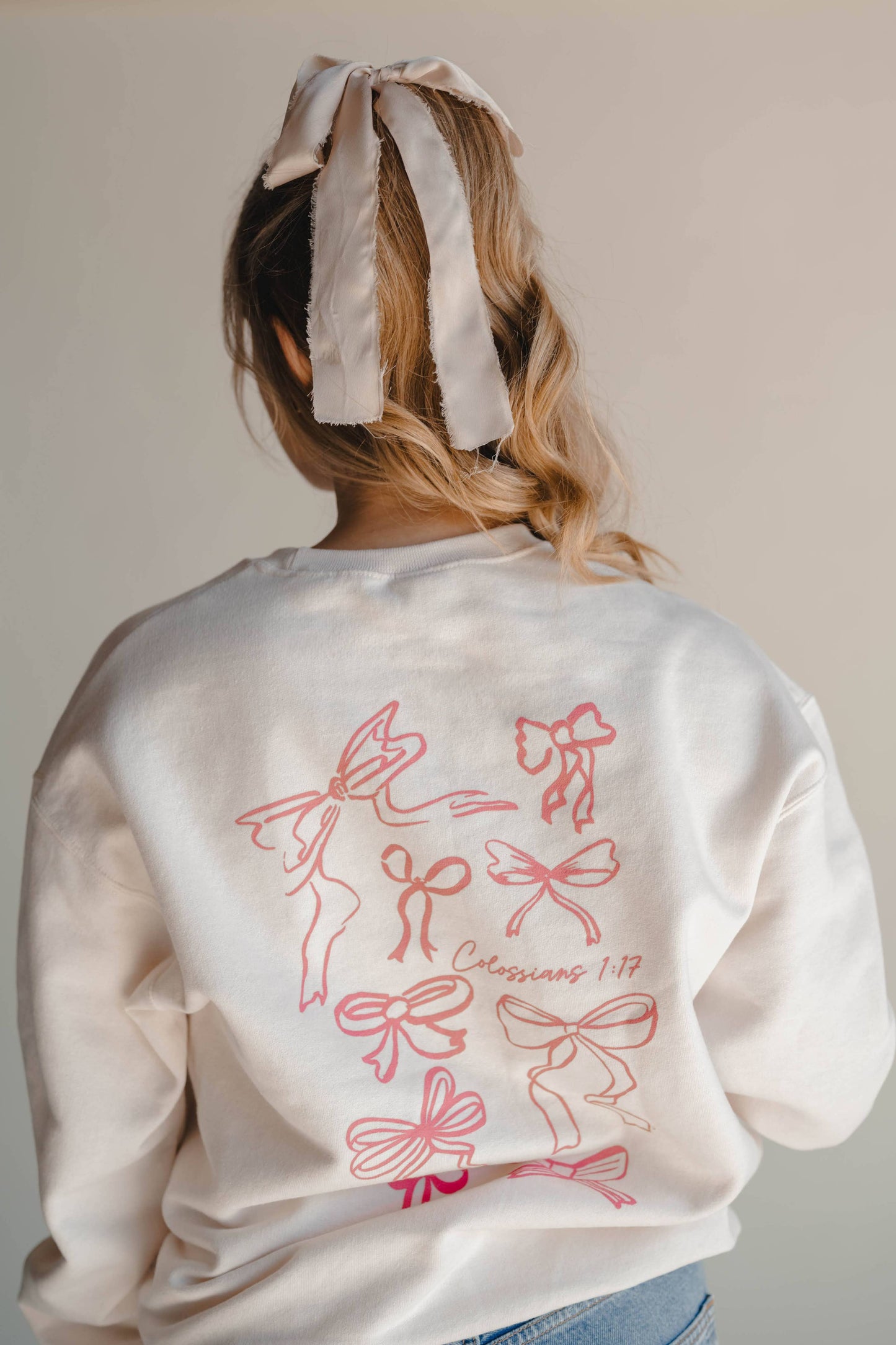 HE HOLDS IT ALL TOGETHER GRAPHIC SWEATSHIRT