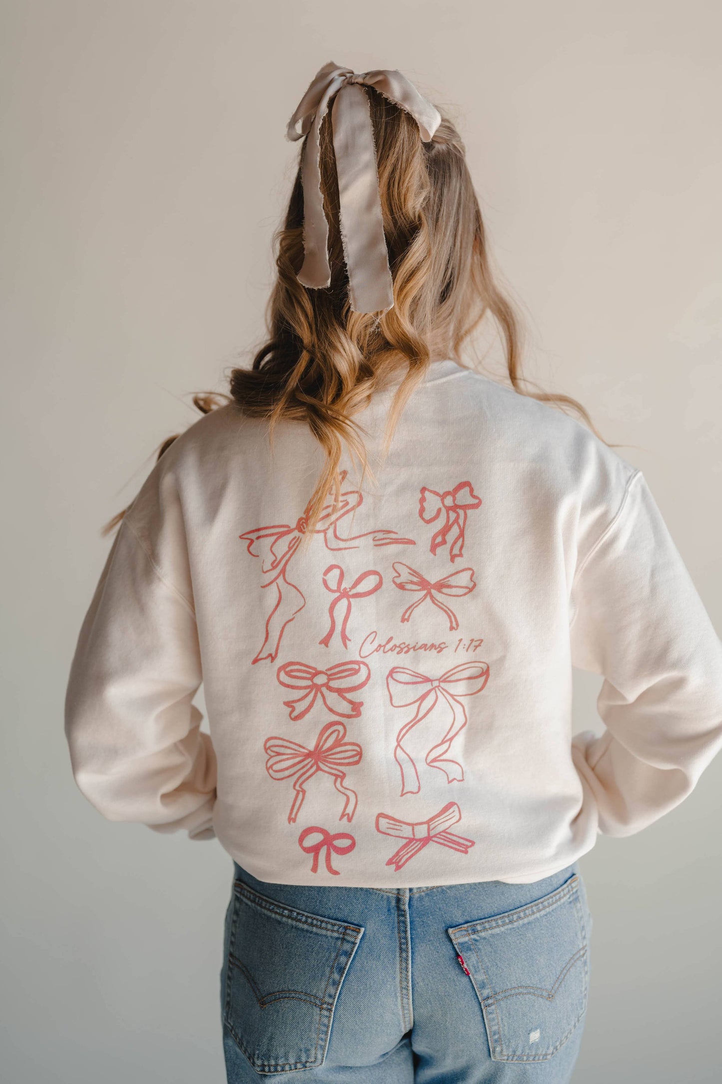 HE HOLDS IT ALL TOGETHER GRAPHIC SWEATSHIRT